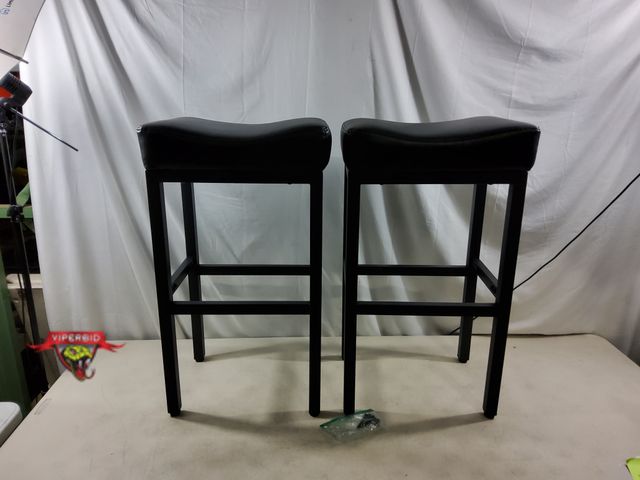 Lot 7-134094 - Set of 2 - Raynesys faux leather upholstered metal barstools. 17.72 x 13.39 x 30.71 inches.