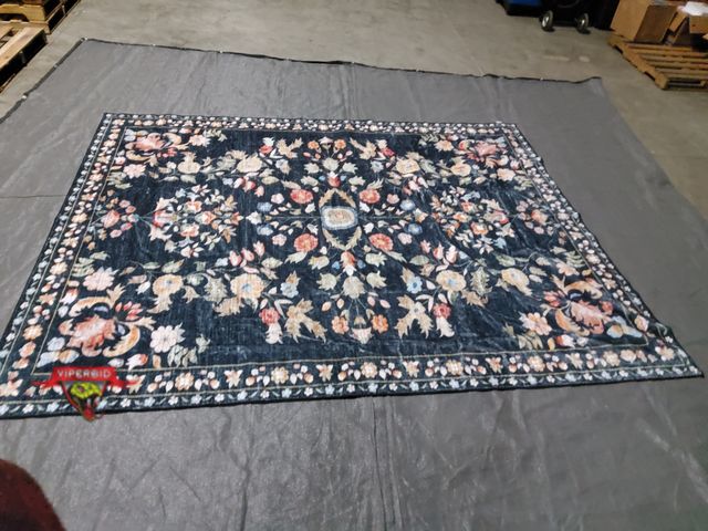 Lot 7-130320 - 8 ft. X 10 ft. Area rug.