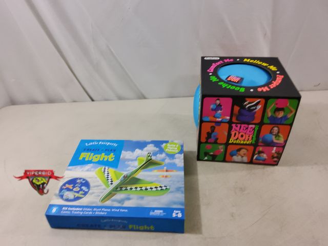 Lot 7-133746 - New! Schylling 8" Nee Doh Dohzee The Groovy Glob Soft Ball and a Little Passports Create + Play Flig...