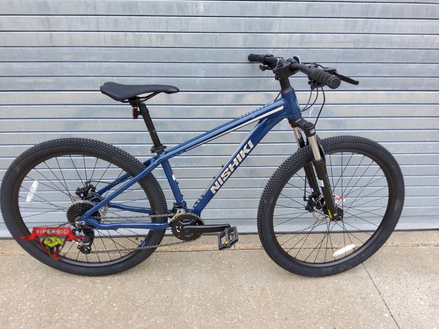 Lot 7-131912 - Retail value $350! Nishiki Colorado adult mountain bike. Wheel size: 27.5". Frame Size: S (5'3" - 5'...
