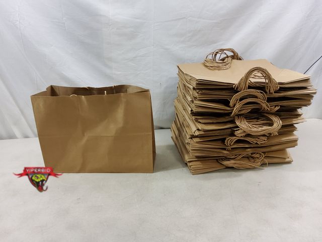 Lot 7-130867 - New! Approximately (200) Brown paper bags with handles. 15-1/2" X 6" X 11-1/2"H.