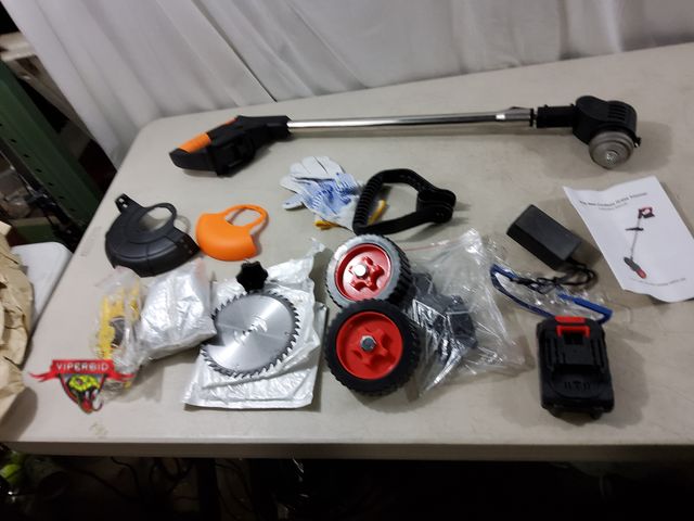 Lot 7-135798 - 21V Cordless cordless grass trimmer. Includes 2 batteries and charger. Tested.