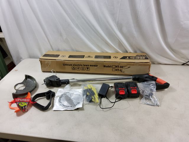 Lot 7-132779 - Gently used. Lithium weed wacker with 2 batteries and charger. Tested to power on.