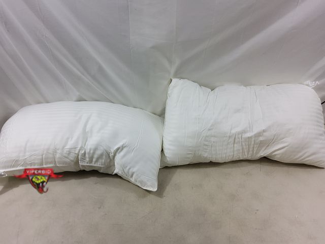 Lot 7-131465 - (2) Beckham Hotel Collection King size down alternative pillows.