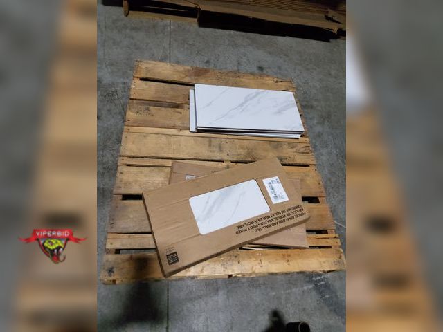 Lot 7-123825 - New! (26) Pieces of porcelain floor and wall tile. 12" X 24" X 0.295" Each. Calacatta Design.