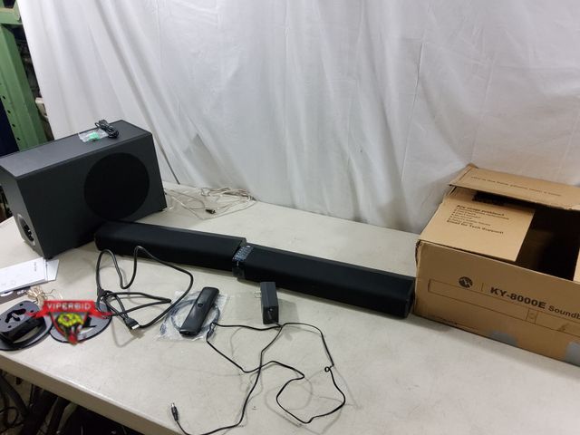 Lot 7-135652 - Assistrust 31" Sound Bar with Subwoofer. 110W Sound Bar with Adjustable Deep Bass &amp; 3 EQ Modes, ...