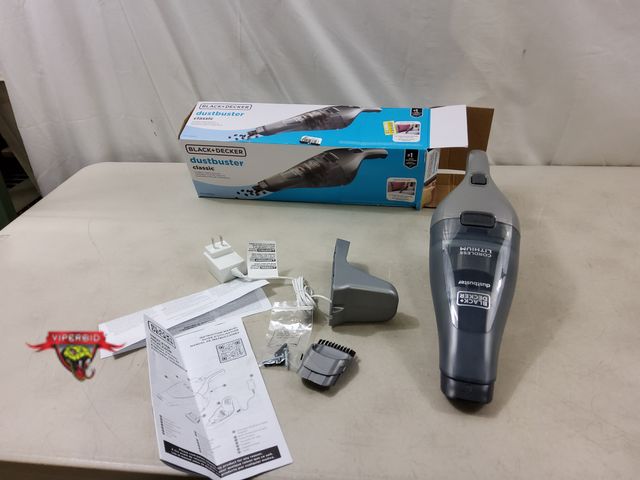 Lot 7-131454 - Black + Decker dustbuter classic cordless hand vacuum. Model HNVC220BCZ01.  Tested.