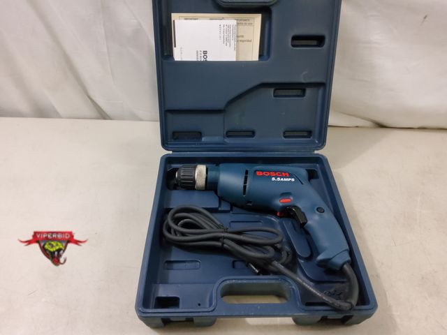 Lot 7-130467 - Like new condition! Bosch 1005VSR Corded drill with hard case.