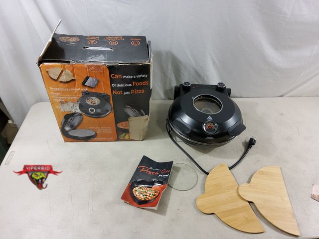 Lot 7-133806 - Used. Pizza maker with 12" Pizza Stone. Tested to power on and heat.