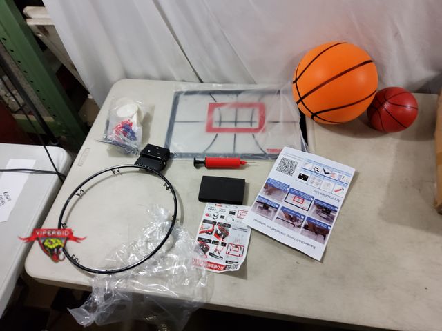 Lot 7-134008 - Wall mounted basketball hoop with 2 different size basketballs.