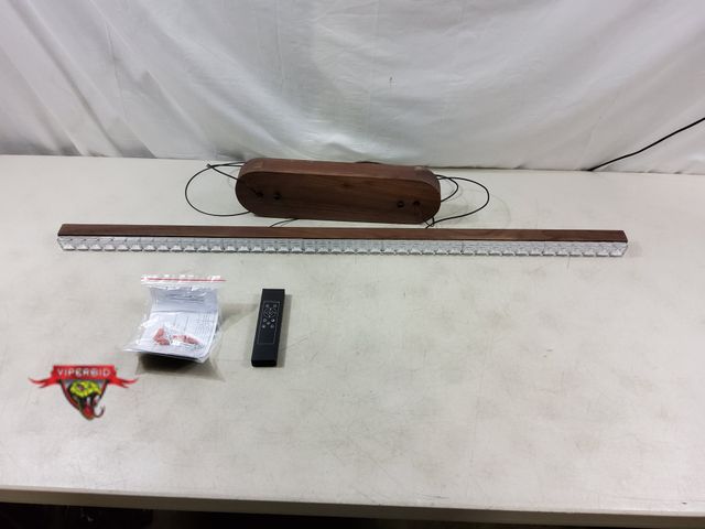 Lot 7-131856 - Retail value $159! 43-1/2"L ZUI wood linear pendant light.