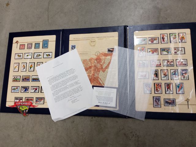 Lot 7-132708 - Franklin Mint The Official United States Olympic Committee Stamp Collection book with cerificate of ...