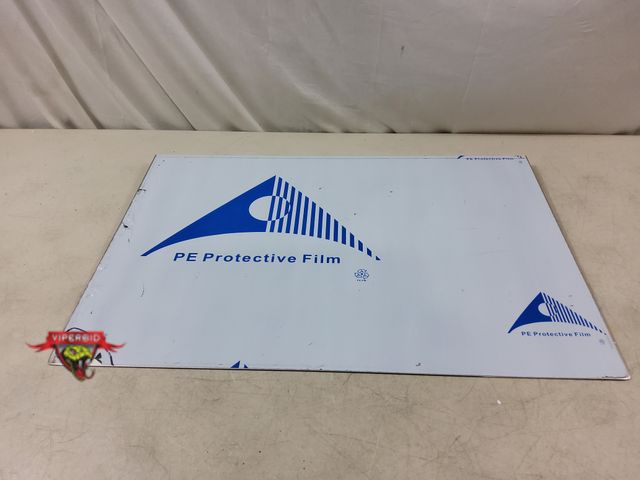 Lot 7-133234 - Otavilem stainless steel lipped cutting board for kitchen countertops. 23.6"L x 15.7"W x 0.05"Th