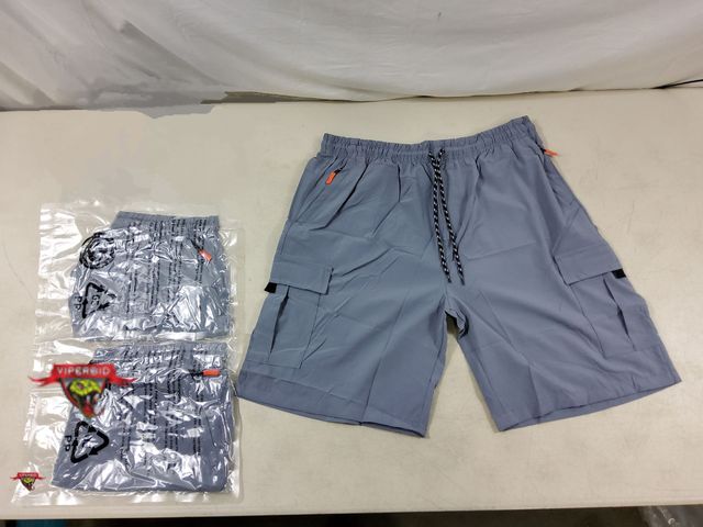 Lot 7-133123 - New! (3) Pairs of Men' s dark gray cargo shorts with 9" inseam. Size: XL.  Has (2) "Cargo" Pockets, ...