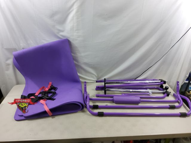 Lot 7-130872 - Folding gymnastic bar with mat. No instructions.