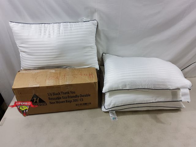 Lot 7-130608 - (4) Semzsom Standard size pillows. 100% Polyester.
