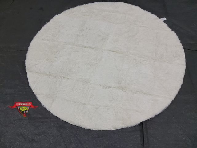 Lot 7-134370 - 6 ft. Round faux fur area rug.