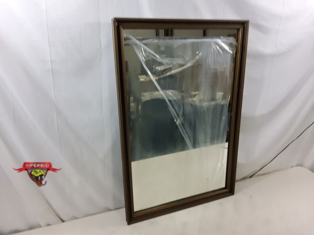 Lot 7-133398 - Framed wall mounted mirror. Can be hung horizontally or vertically. 35-5/8" X 23-3/4".