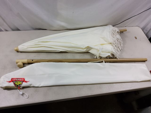 Lot 7-131402 - 6.5 Ft. Patio umbrella with fringe.