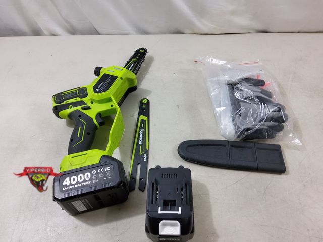 Lot 7-131487 - No Charger. Mini cordless saw with 2 batteries. Tested - Powers on &amp; Blade moves. Needs cleaning...