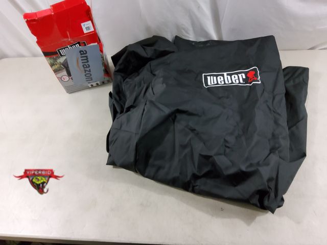 Lot 7-135636 - Weber grill cover. 48" X 27" X 42"H.