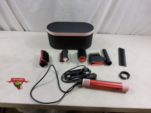 Lot 7-123782 - Retail value $519! Dyson airwrap with attachments. No Diffuser included.