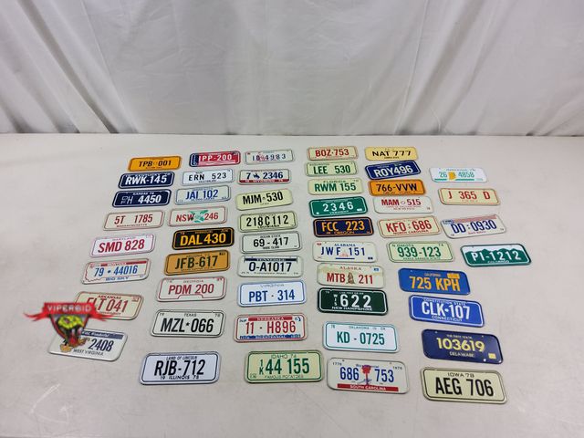 Lot 7-123399 - No Duplicates. 1 of every state! (50) Assorted mini state license plates. 4-7/8" X 2".
