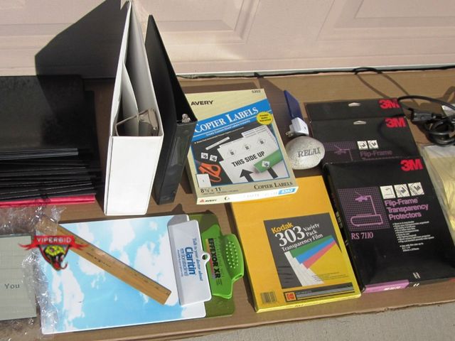 Lot 7-132771 - Miscellaneous office supplies including a few unopened boxes of transparency related materials.