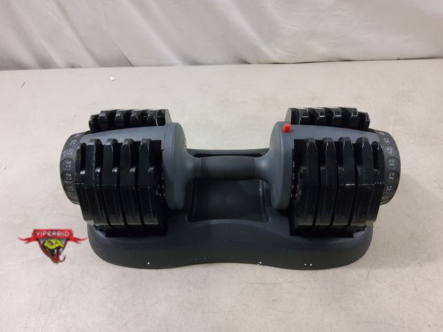 Lot 7-131870 - 50 lb. Adjustable weight dumbbell with base.