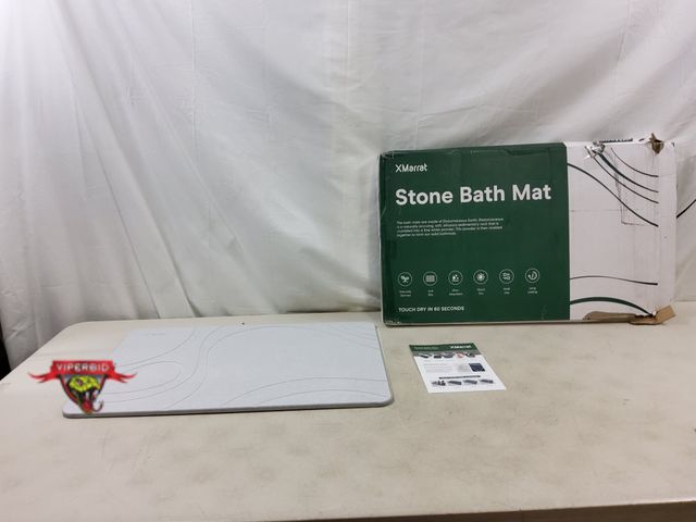 Lot 7-130041 - Stone bath mat. 23.6" X 15.4".