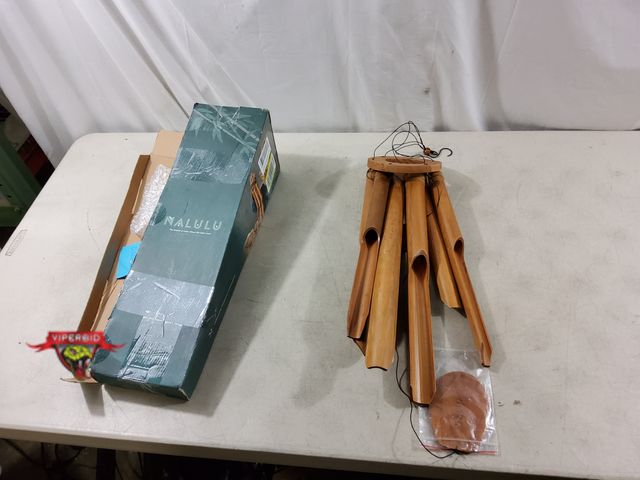 Lot 7-135643 - Nalulu handcrafted bamboo wind chime. 42".