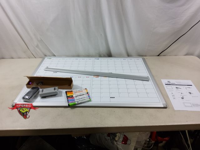Lot 7-134999 - 36" X 24" Wall mounted Calendar white board with accessories.