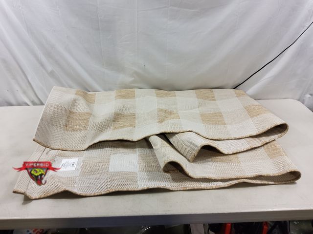 Lot 7-131440 - 3 ft. 9" X 5 ft. 3" Outdoor patio rug.