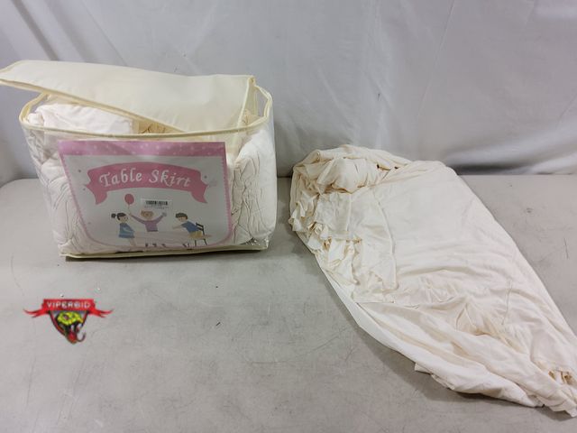 Lot 7-133749 - (8) Spandex ivory tablecloth with skirt for 6 ft / 8 ft tables.
