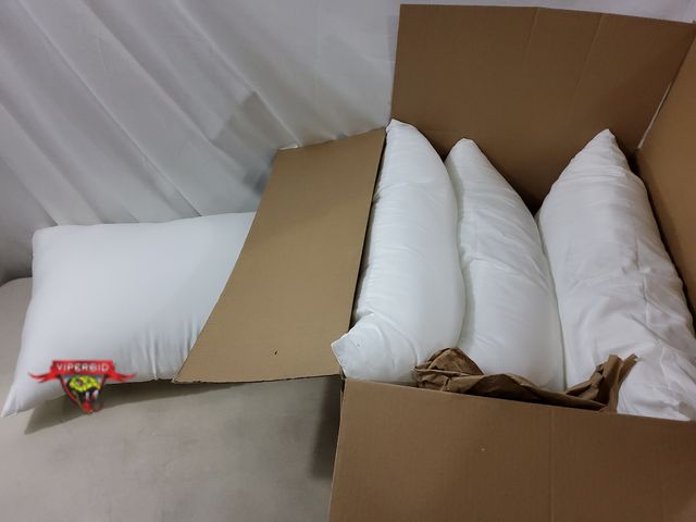 Lot 7-132860 - (4) Bed pillows. 24" X 16".