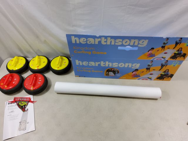 Lot 7-130673 - Hearthsong kingdom curling game. Lightly used. Mat is 11-1/2 ft. X 2-1/2 ft. NOTE: Missing 1 Red "Cu...