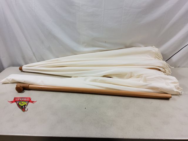 Lot 7-131268 - Seazul Outdoor Patio Umbrella (Aprx. 80" dia. x 86"T) *Damage to bottom See Picture*