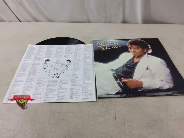 Lot 7-135728 - Michael Jackson Thriller vinyl record. Damage to jacket cover - see pics.