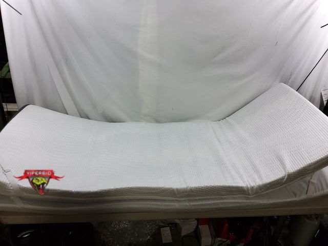 Lot 7-130481 - Memory foam mattress topper with corner straps.  59" X 79" X 3".