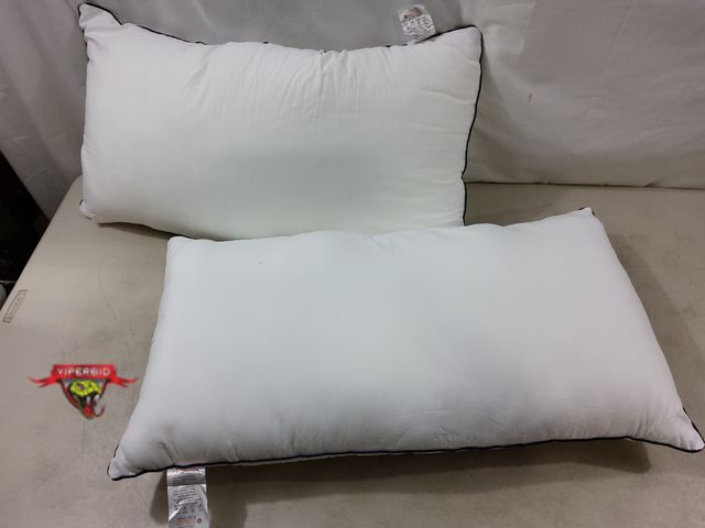 Lot 7-131755 - (2) Mzoimzo King size polyester pillows.