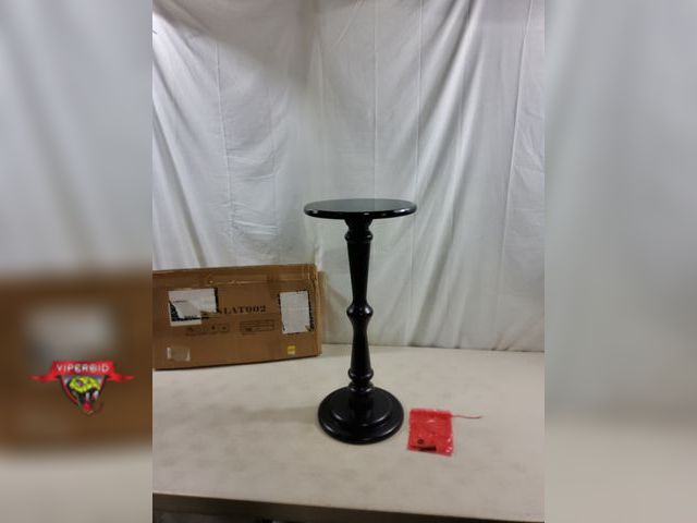 Lot 7-123480 - SwallowLiving small round side table. Measurements 12" x 25".