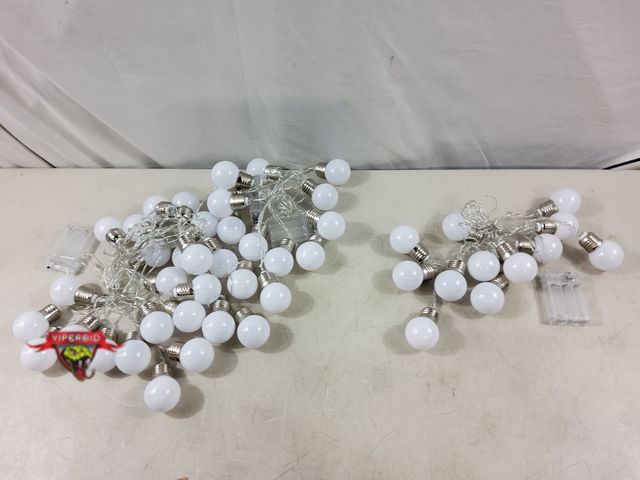 Lot 7-133812 - (4) Battery operated string lights. Each one needs (3) AA Batteries. 12 lights per. All Tested.