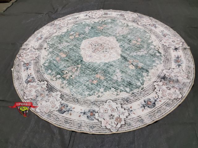 Lot 7-134663 - 9 Ft. Round area rug.