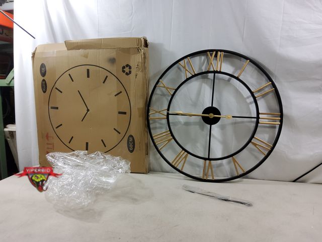 Lot 7-134197 - 23-3/4" Battery operated wall clock. Requires (1) AA Battery.