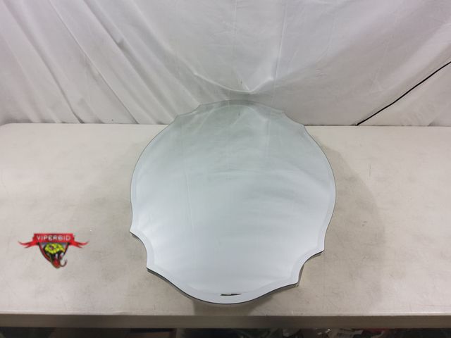 Lot 7-132890 - Retail value $159! Frameless Assymetrical Oval Medicine Cabinet with Beveled Mirror. 20" X 30".