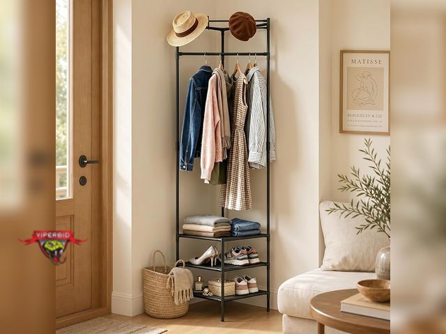 Lot 7-134110 - Freestanding garment rack with 3 tier storage shelves. Approx. 16.14"D x 16.14"W x 70.07"H.