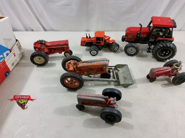 Lot 7-123810 - Mostly Vintage! Lot of assorted die-cast metal tractors / tractor accessories.