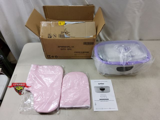 Lot 7-131524 - Sunvivi paraffin wax warmer machine. Model ZPW001PL.