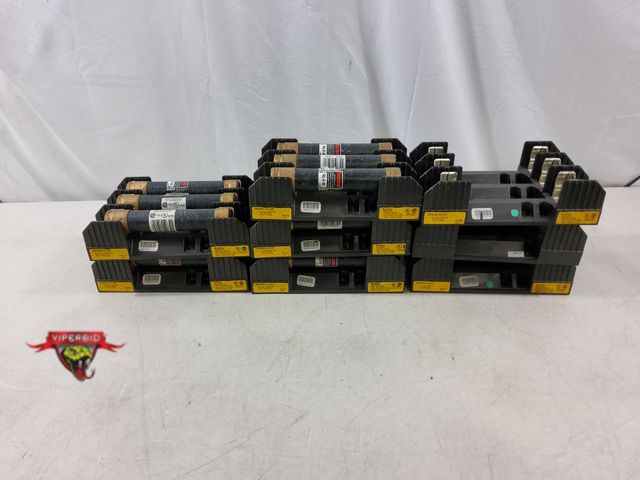 Lot 7-134890 - Used. (8) Buss fuse holders R60060-3COR. (5) Of them have Fusetron fuses FRS-R-60.