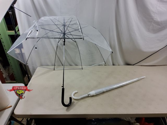 Lot 7-134343 - (2) Clear umbrellas.
